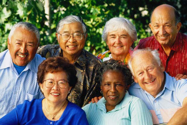 A multicultural group of smiling senior citizens