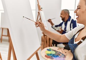 People painting on canvas