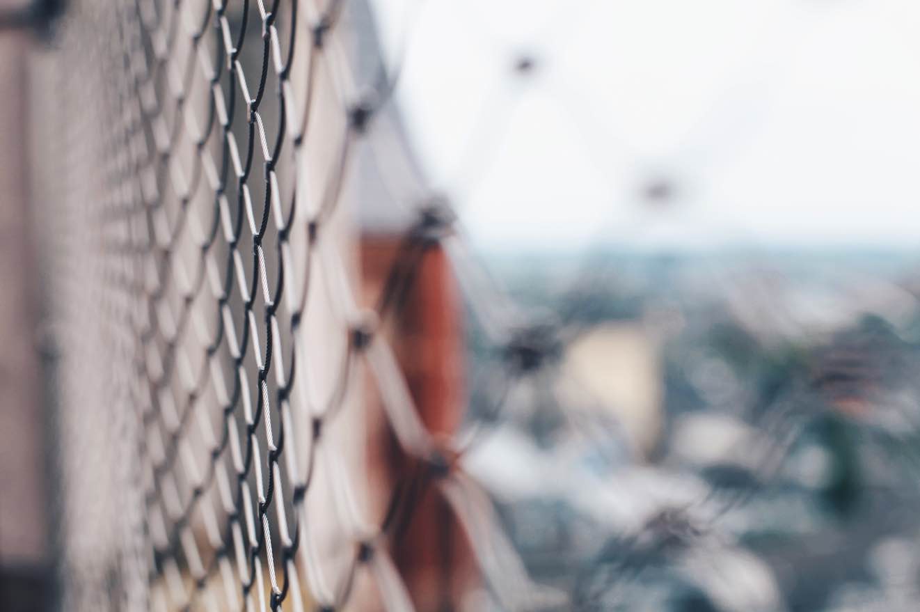 a close up view of a chain link fence